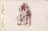 Racing cyclists and starter circa 1898